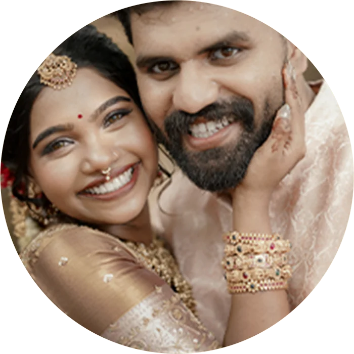Close-up portrait of a smiling wedding couple