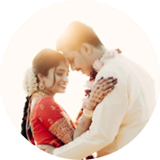 Bride and groom sharing a sunlit moment